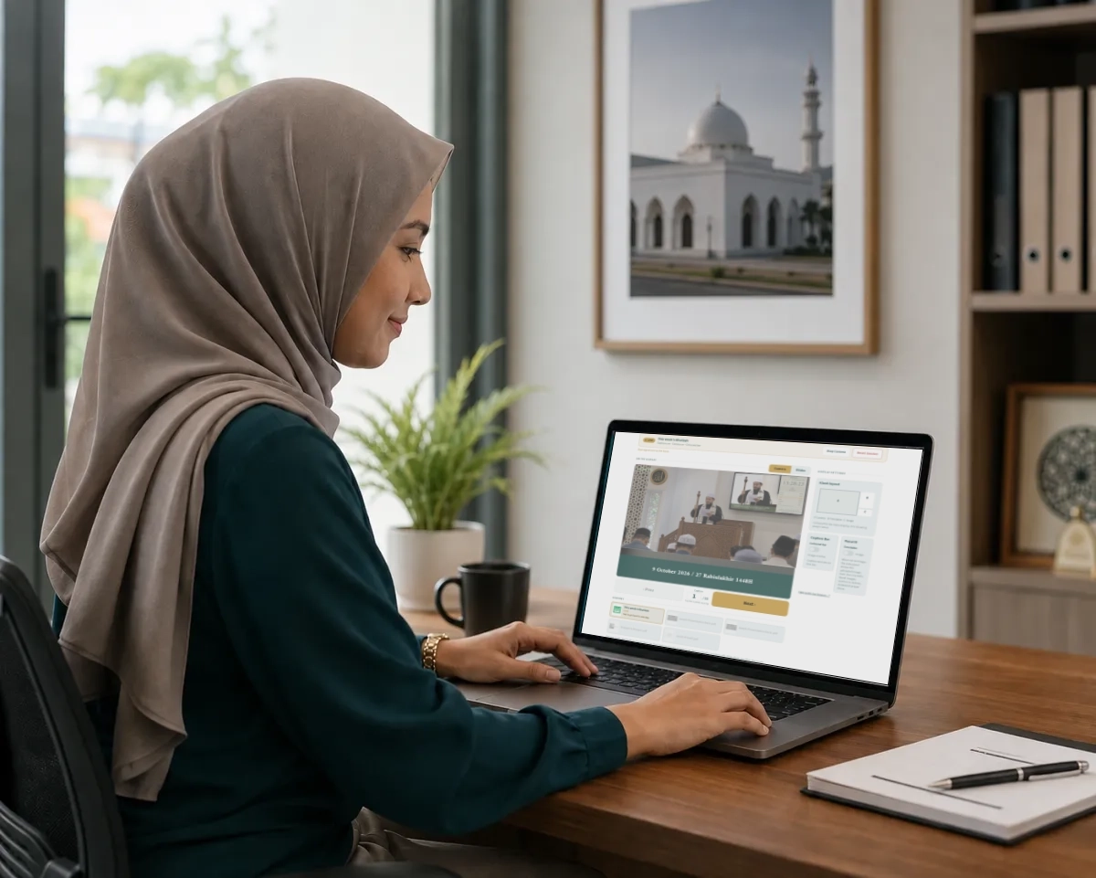 A mosque admin updating the display from the Awqōt dashboard on a laptop